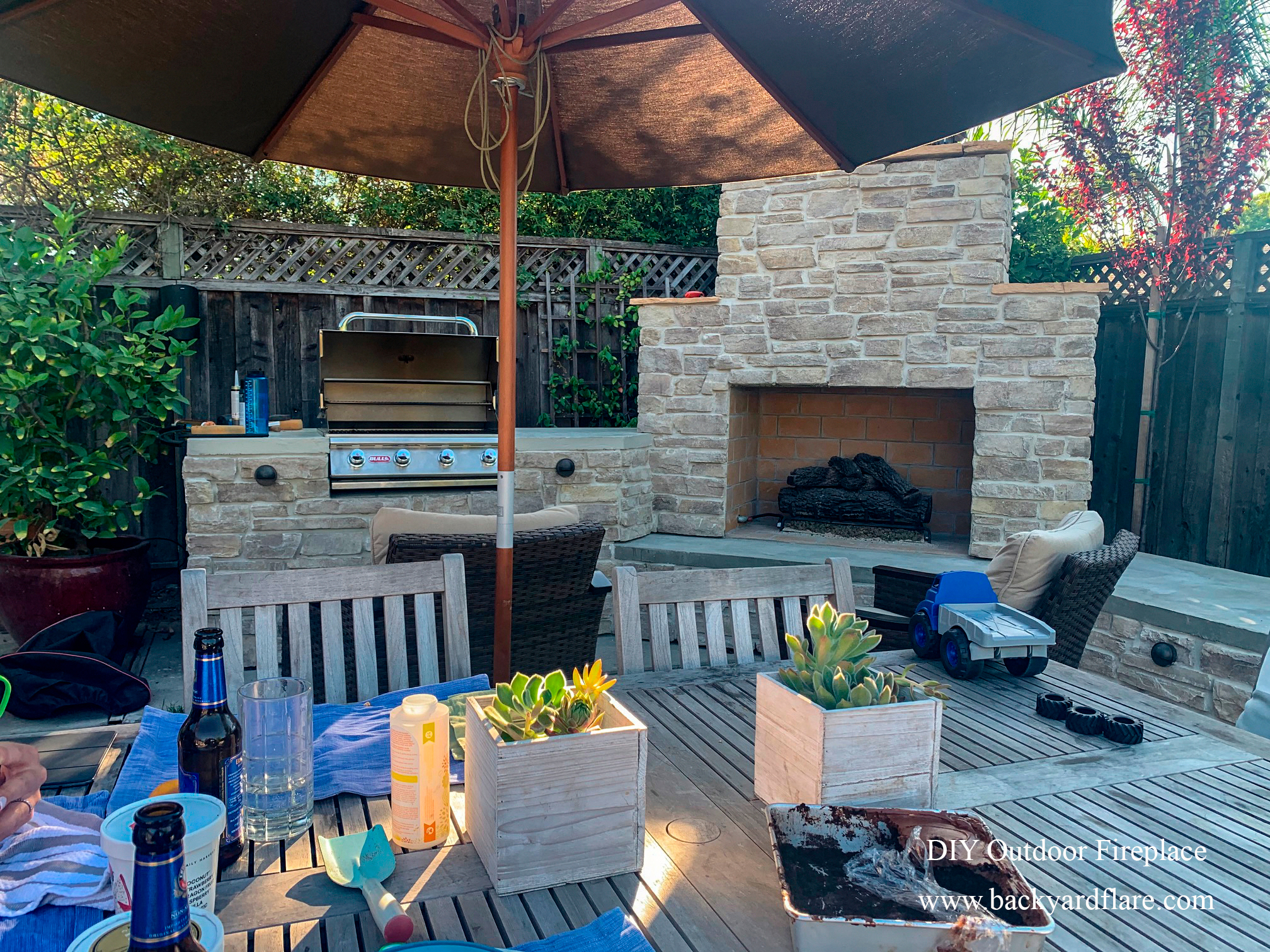 DIY Outdoor Fireplace with storage and seating